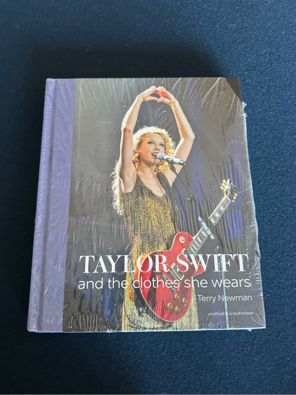 Taylor Swift Hard Cover Book about Taylor & the clothes she wears! Great Gift🎤🎸